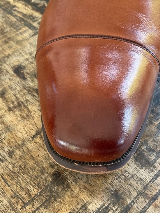Florsheim men’s tan shoe,12 D.